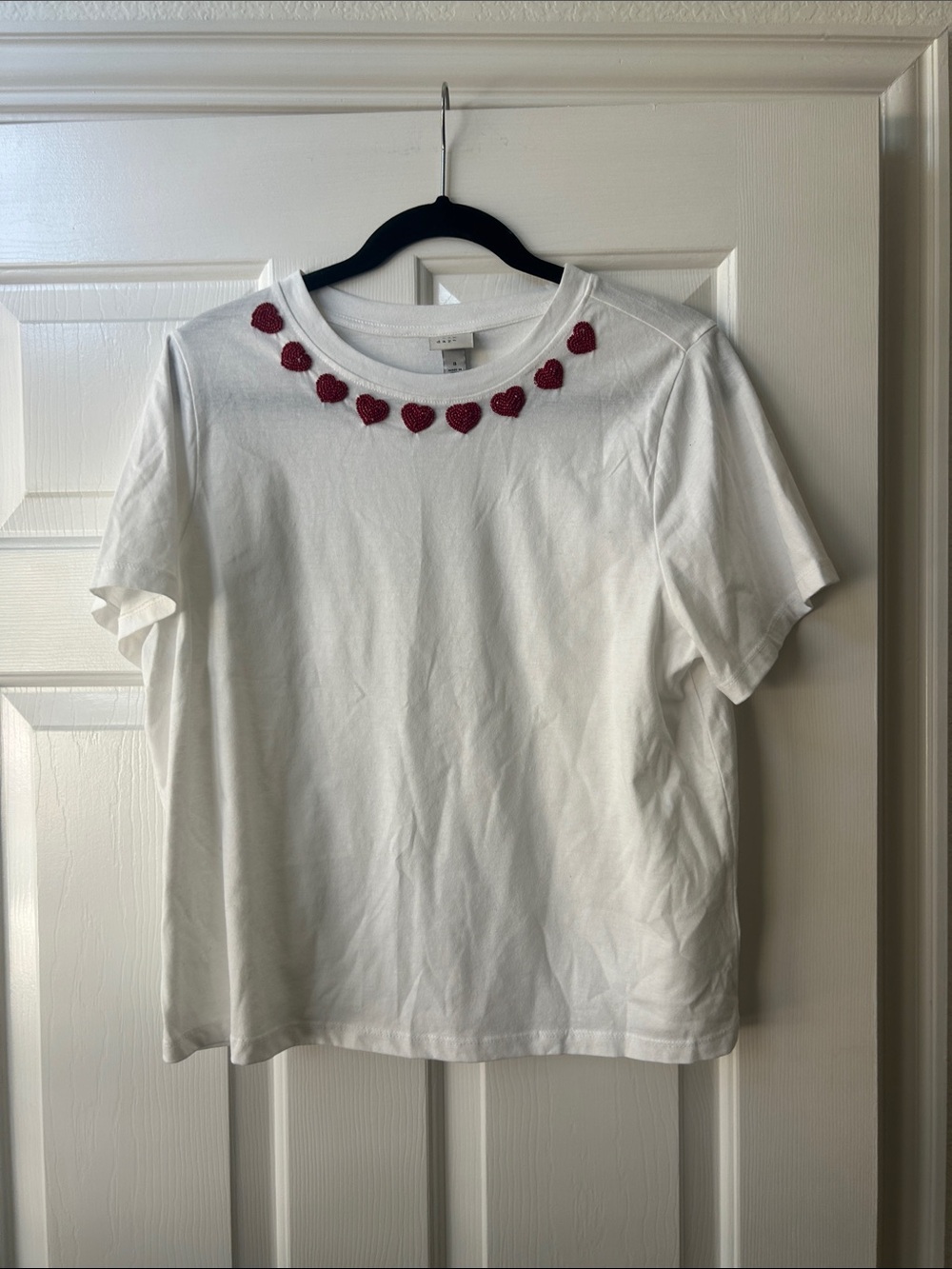 a new day White Tee with Red Heart Embellishments